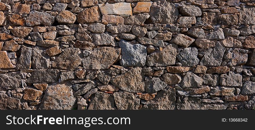 The Wall Was Built Of Rough Stone