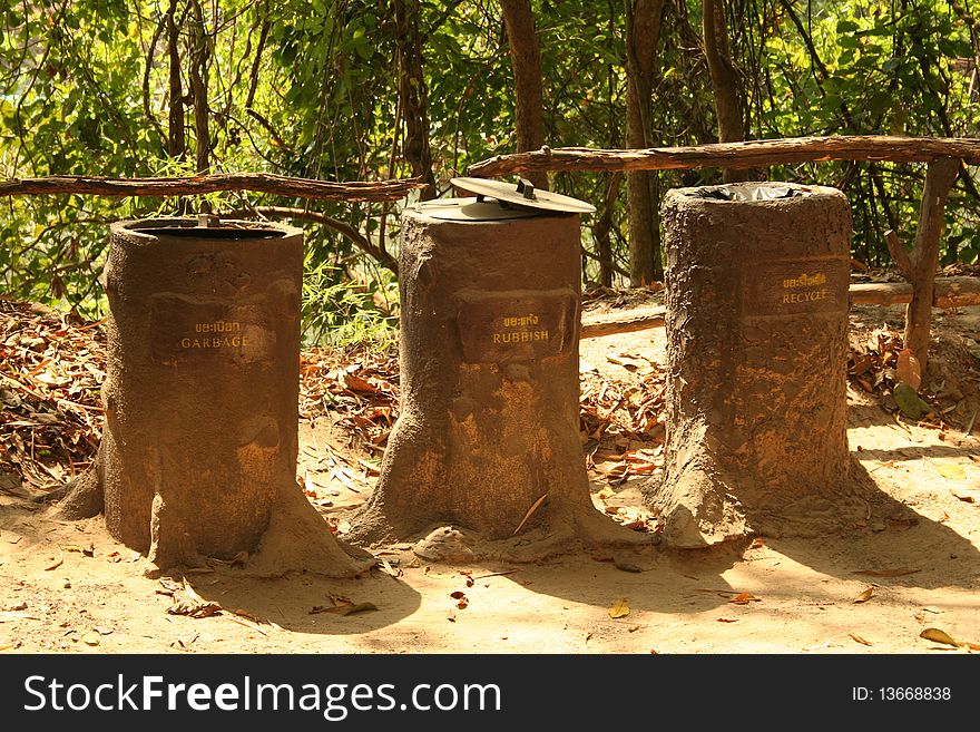 Bins look like trees at Kanchanaburi