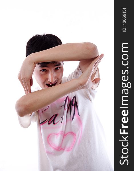 The Asian guy the dancer poses in a white vest on a white background