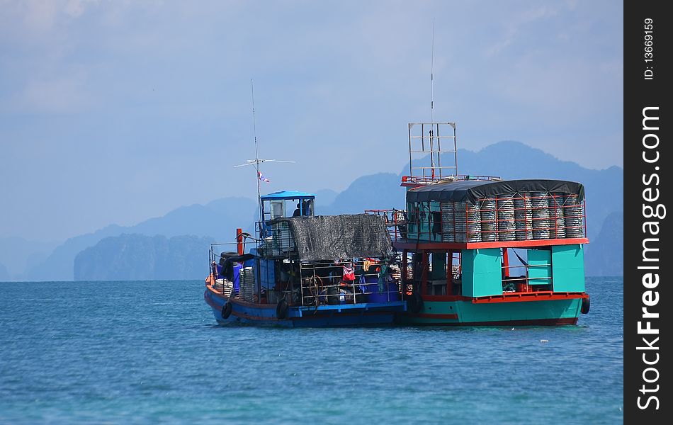 Fishing boat is floating in the Thai sea