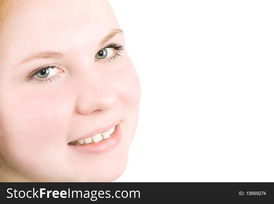 Close-up of smiling Teenager girl looking on the white background