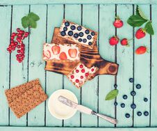 Healthy Sandwiches With Soft Cheese And Berries On Bread Crisps On Shabby Chic Background. Healthy Eating And Summer Gifts Concept Stock Photos