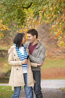 Romantic Teenage Couple In Autumn Park Stock Images Romantic Teenage Couple In Autumn Park Stock Images