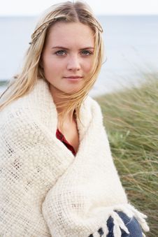 Young Woman Standing In Sand Dunes Royalty Free Stock Images