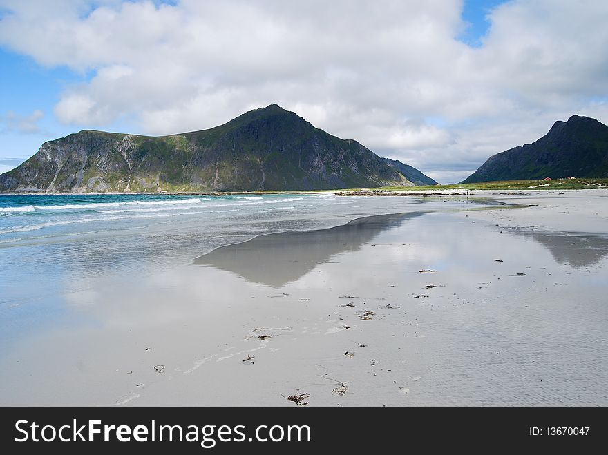 A beautiful beach between Norwegian mountains. A beautiful beach between Norwegian mountains