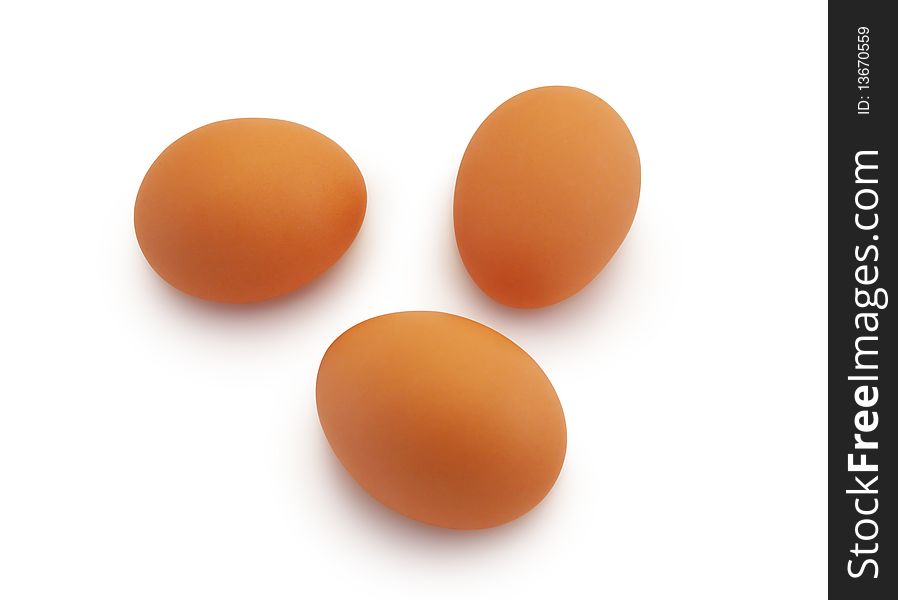 Three eggs on a white background