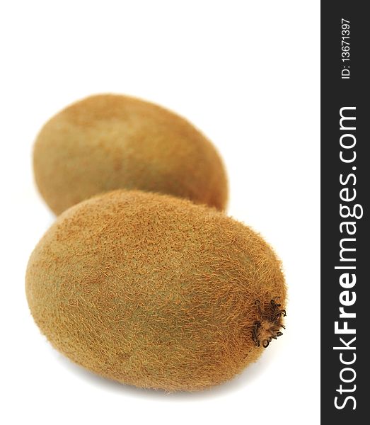 Two kiwifruits isolated on a white background