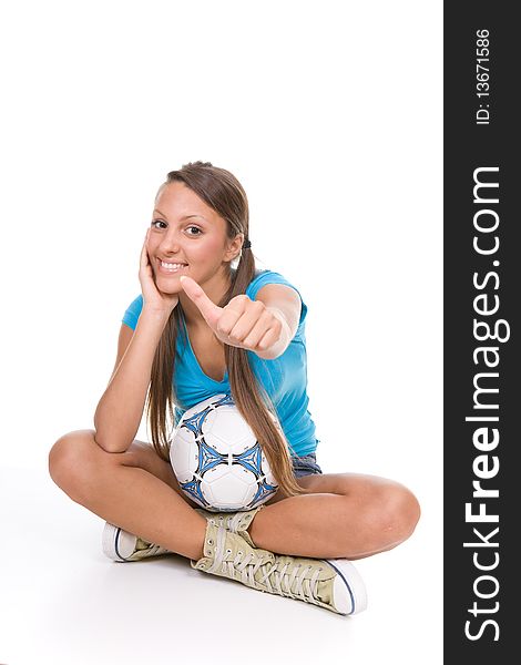 Pretty teenager with ball over white background. Pretty teenager with ball over white background