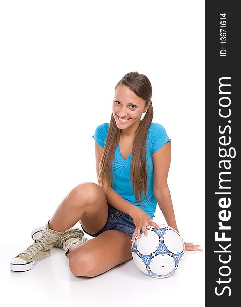 Pretty teenager with ball over white background. Pretty teenager with ball over white background