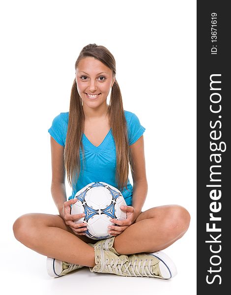 Pretty teenager with ball over white background. Pretty teenager with ball over white background