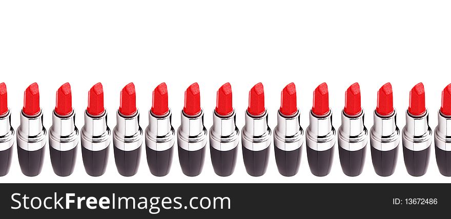 Open lipsticks on the white background