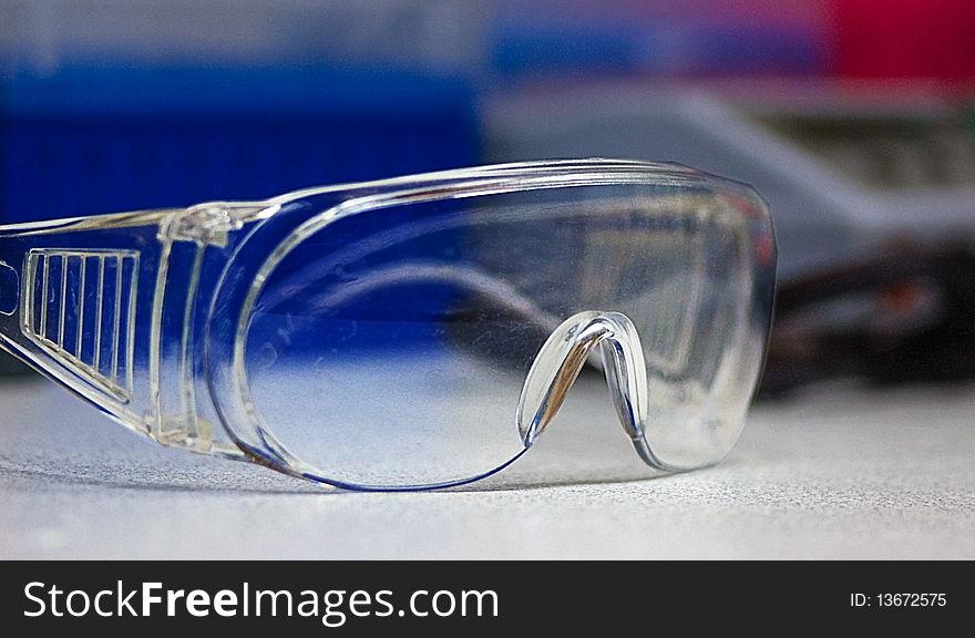 Plastic protective glasses in research lab