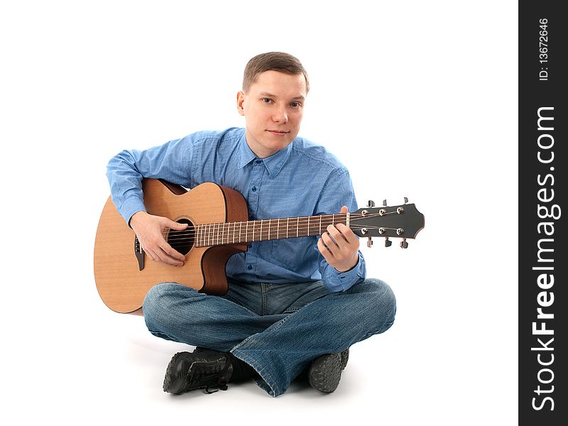 Man with acoustic guitar isolated over white