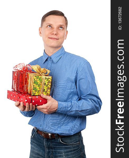Young man with gift boxes isolated on a white background