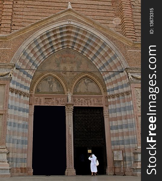 The doorway of the great church at basillica of sant anastasia in the city of verona in italy. The doorway of the great church at basillica of sant anastasia in the city of verona in italy