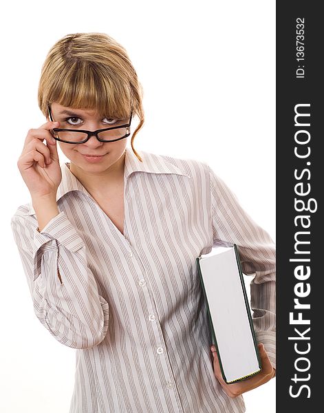 Beautiful young student with a book on white background