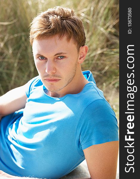 Portrait Of Young Man On Beach