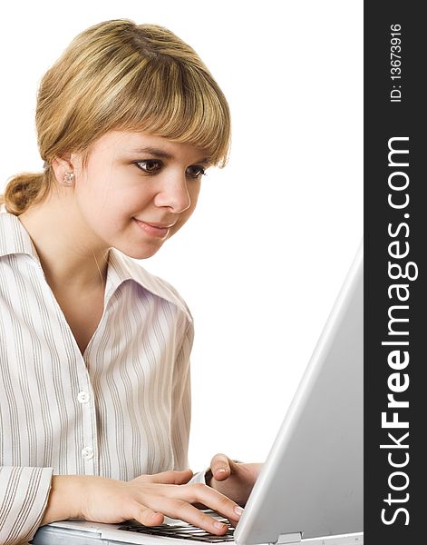 Beautiful young girl with laptop on a white