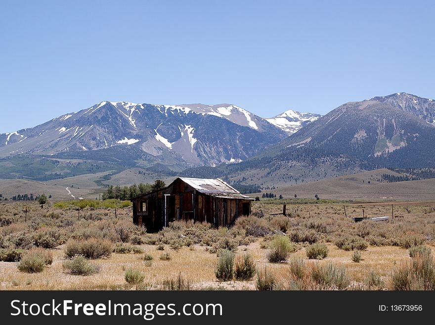 Abandoned old farm house by Sierra Nevadas. Abandoned old farm house by Sierra Nevadas