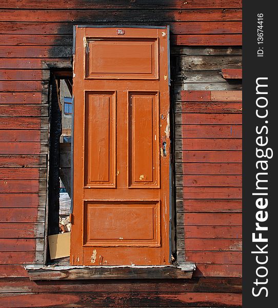 Old wooden door in window