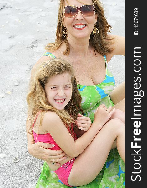 Grandma & cute little girl at the beach