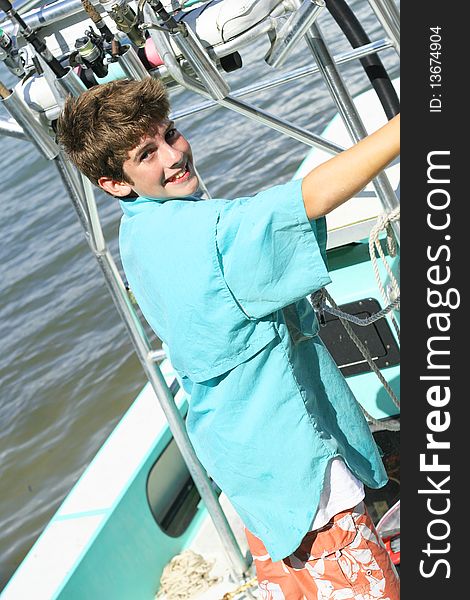 Shot of a young boy on a boat