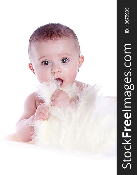 Baby with feathers on white background