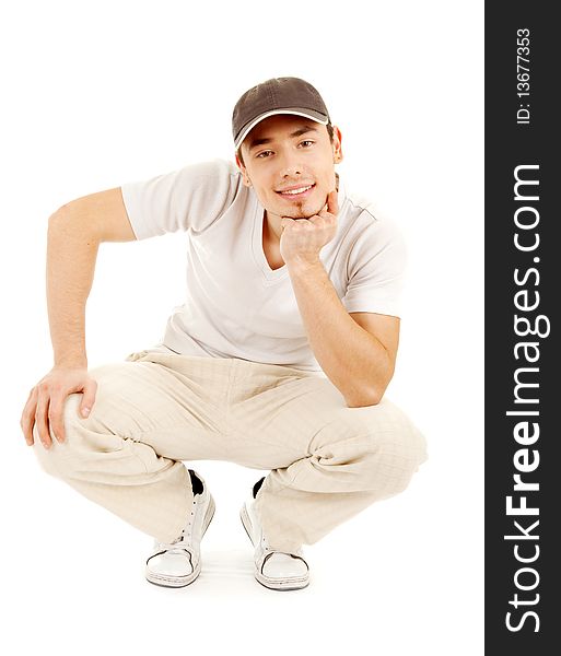 Smilling young man in a casual dress on white background. Smilling young man in a casual dress on white background