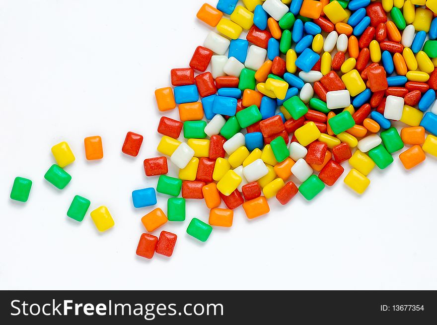 Various colorful candy on white background