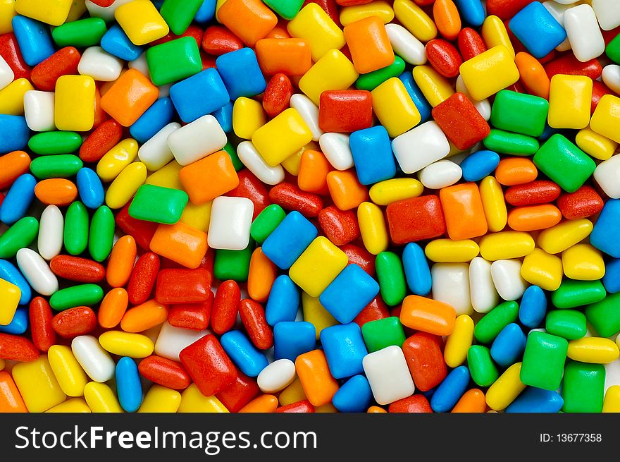 Various colorful candy on white background