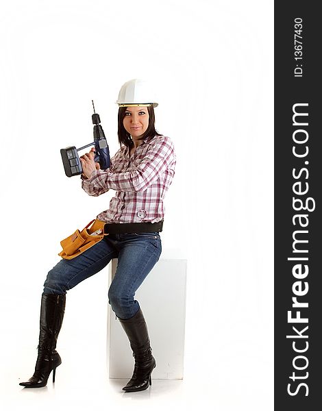 Girl with helmet and drill