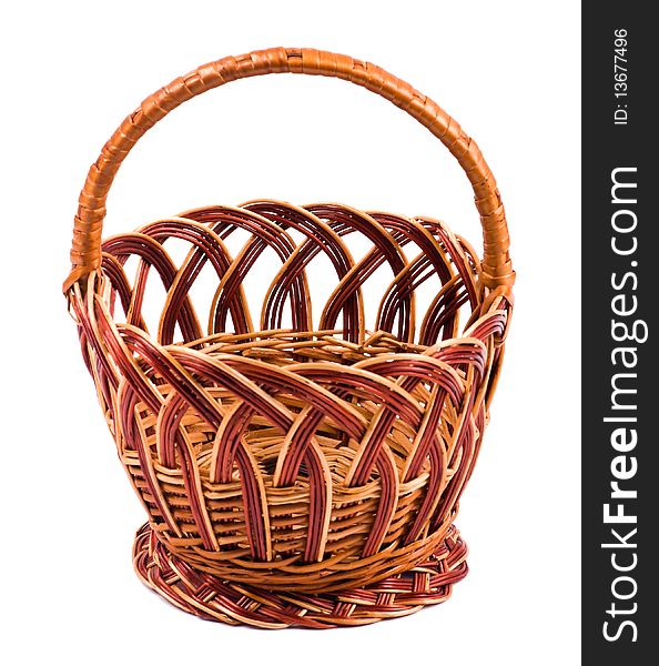 Traditional wicker basket isolated on white background