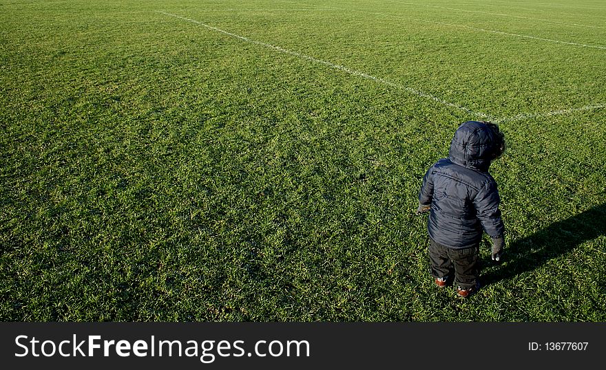 Toddler On Football Pitch