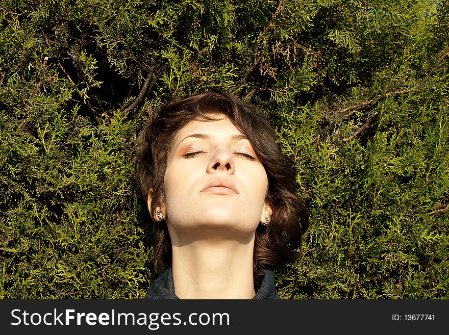 Beautiful girl relaxing in the park