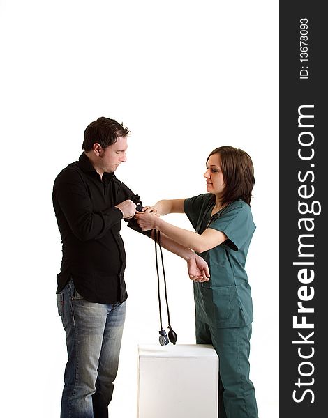 Photo of female doctor with male patient during a medical checkup