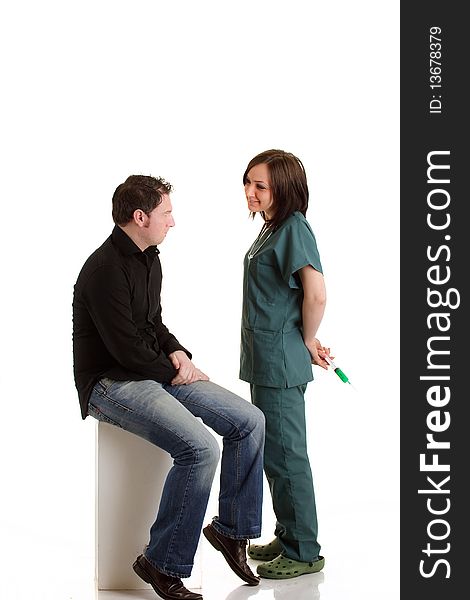 Photo of female doctor with male patient during a medical checkup