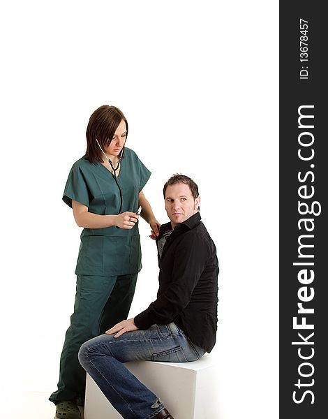 Photo of female doctor with male patient during a medical checkup