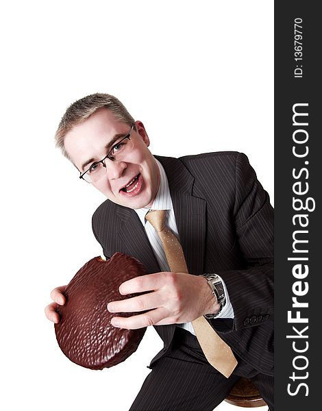 Businessman with chocolate pie in hands