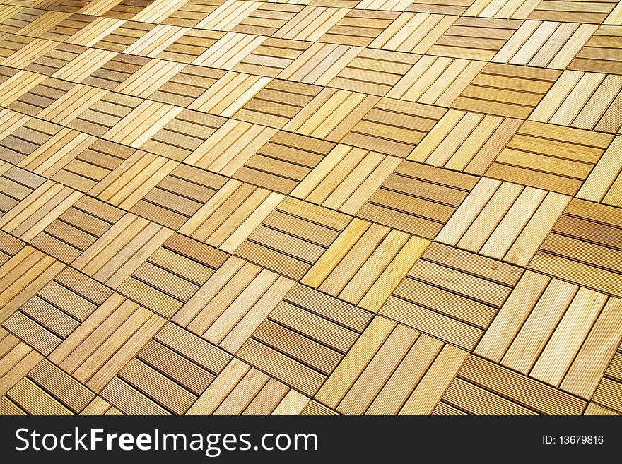 Tiled flooring square strips of wood. Tiled flooring square strips of wood