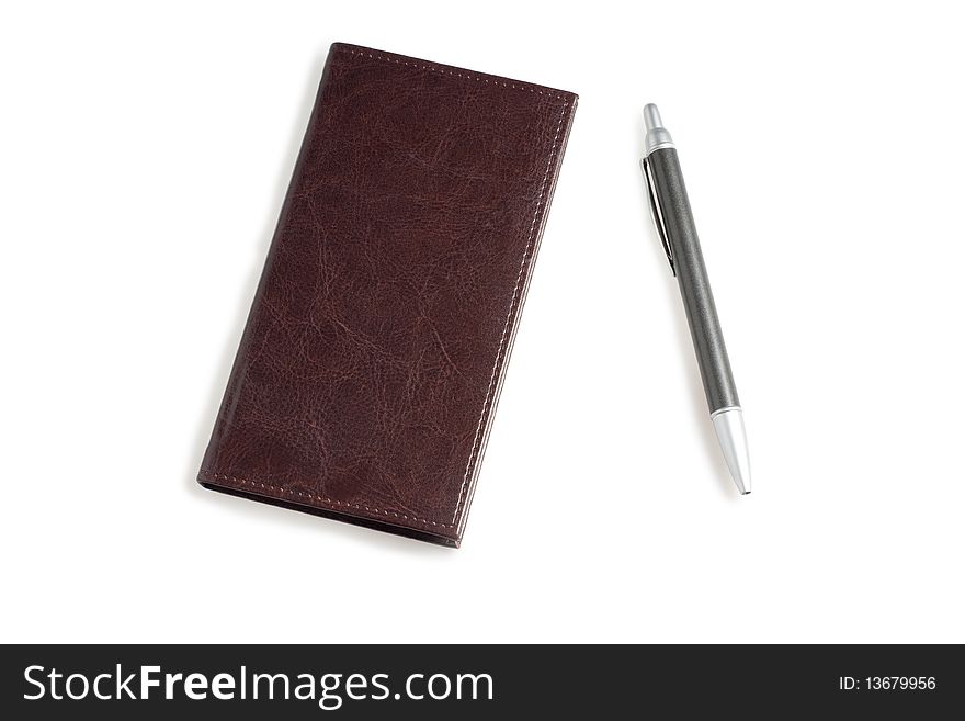 Notebook and pen isolated on white background. Notebook and pen isolated on white background
