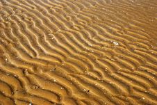 Waves On The Sand Stock Images