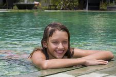 Girl Portrait Relaxing In Swimming Pool Royalty Free Stock Photography