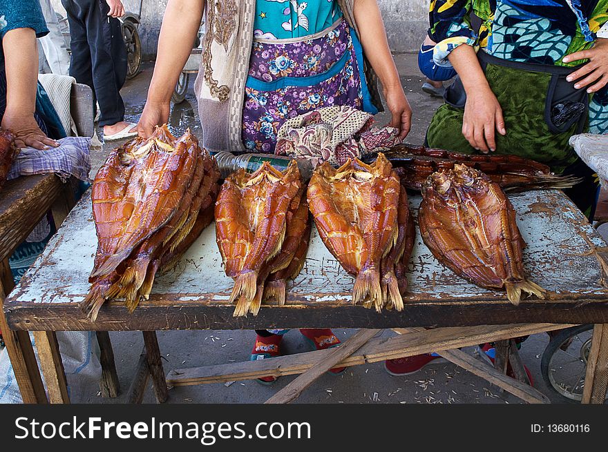 Sale dried fishes on street