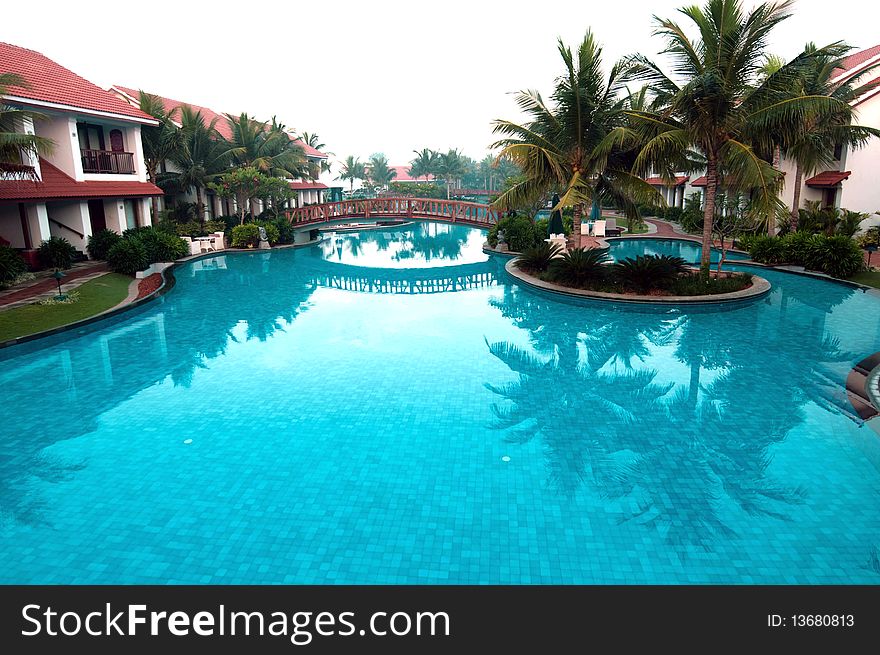 A beautiful large swimming pool at a local resort
