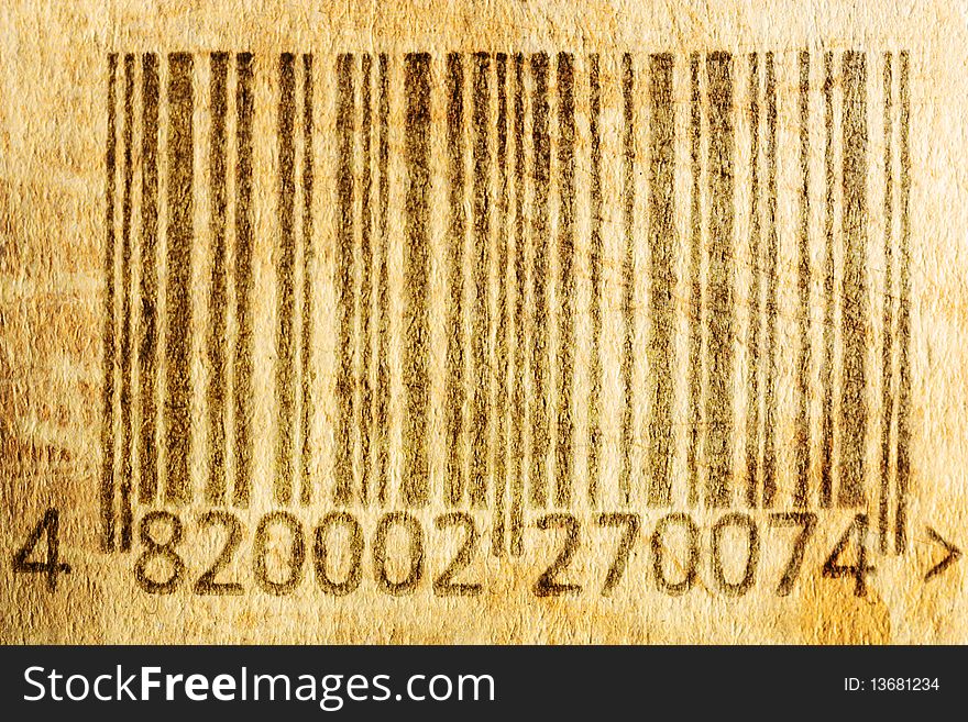 Old yellowed vintage barcode, grunge background