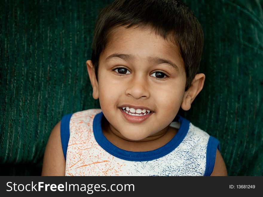 Handsome indian kid smiling for you