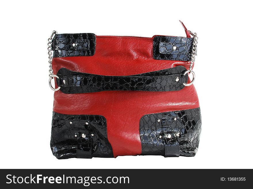This is a beautiful black and red leather handbag isolated on a white background. This is a beautiful black and red leather handbag isolated on a white background.