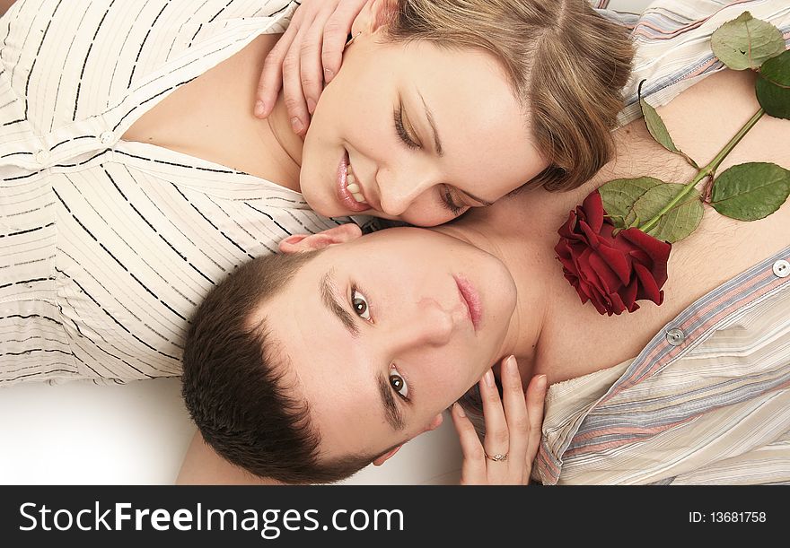 Beautiful young couple with rose. Beautiful young couple with rose