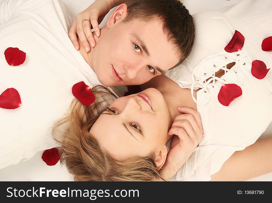 Beautiful young couple with rose. Beautiful young couple with rose