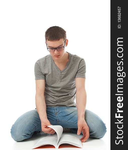 The young student with the book isolated on a white background